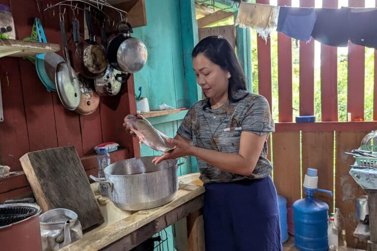 Riverside families in the Amazon change meals as mercury poisons staple fish